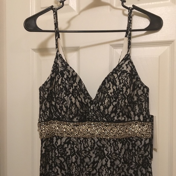 Sequin Hearts Dresses & Skirts - Black lace formal gown with slit in front